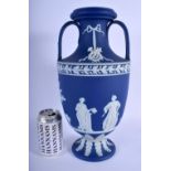 A LARGE WEDGWOOD BLUE JASPERWARE TWIN HANDLED PORCELAIN VASE decorated in relief with classical figu