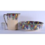 A LARGE ART DECO ROYAL DOULTON WASH JUG AND BASIN decorated with pine cones and flowers. 30 cm x 27