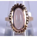 A 14CT GOLD AND CRYSTAL RING. 6 grams. T/U.