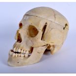 A LATE 19TH CENTURY ANATOMICAL MODEL OF A HUMAN SKULL with moving jaw and removable top. 20 cm x 16