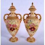 Royal Worcester pair of two handled blush ivory vases and covers painted with roses, date mark 1919,