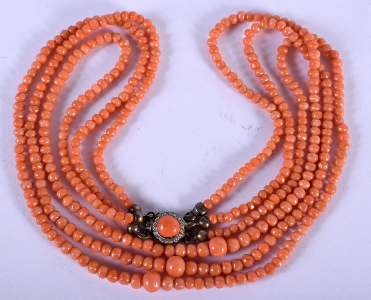 AN ART DECO CORAL NECKLACE. 40 cm long.