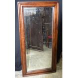 AN INDONESIAN HARDWOOD MIRROR. 121 cm x 60 cm.