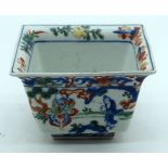 A small Chinese planter decorated with figures in a landscape and a dragon 8 x 12cm