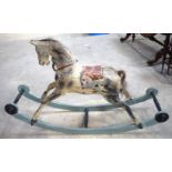 AN ANTIQUE ROCKING HORSE. 71 cm x 120 cm.