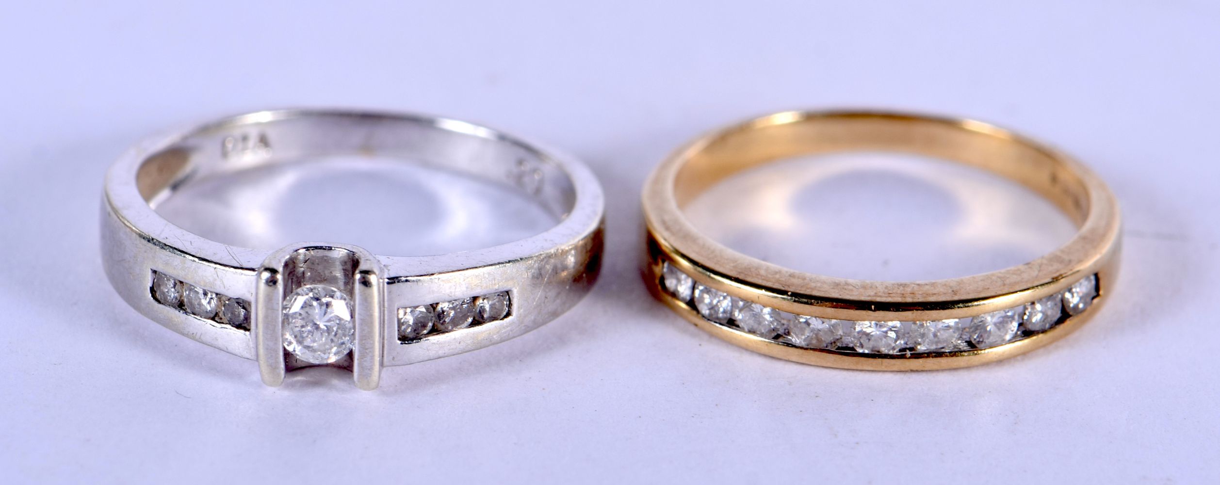 A 9CT GOLD RING and another. 4 grams. J & L. (2)