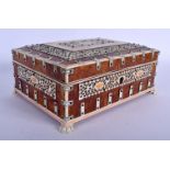 A 19TH CENTURY ANGLO INDIAN CARVED TORTOISESHELL AND IVORY CASKET decorated with foliage and vines.