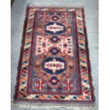 A Middle Eastern Rug 195 x 110cm.