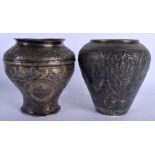 TWO EARLY MIDDLE EASTERN PERSIAN SILVER VASES decorated with buddhistic figures and landscapes. 1180