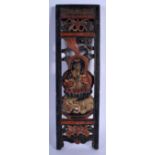 A RARE 18TH CENTURY JAPANESE EDO PERIOD CARVED AND LACQUERED PANEL depicting a buddhistic figure upo