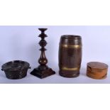 AN 18TH CENTURY ENGLISH CARVED FRUITWOOD CANDLESTICK together with others. Largest 27 cm high. (4)