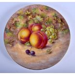 Royal Worcester plate painted with peaches and grapes by J. Freeman, signed, date mark 1947. 26.5cm