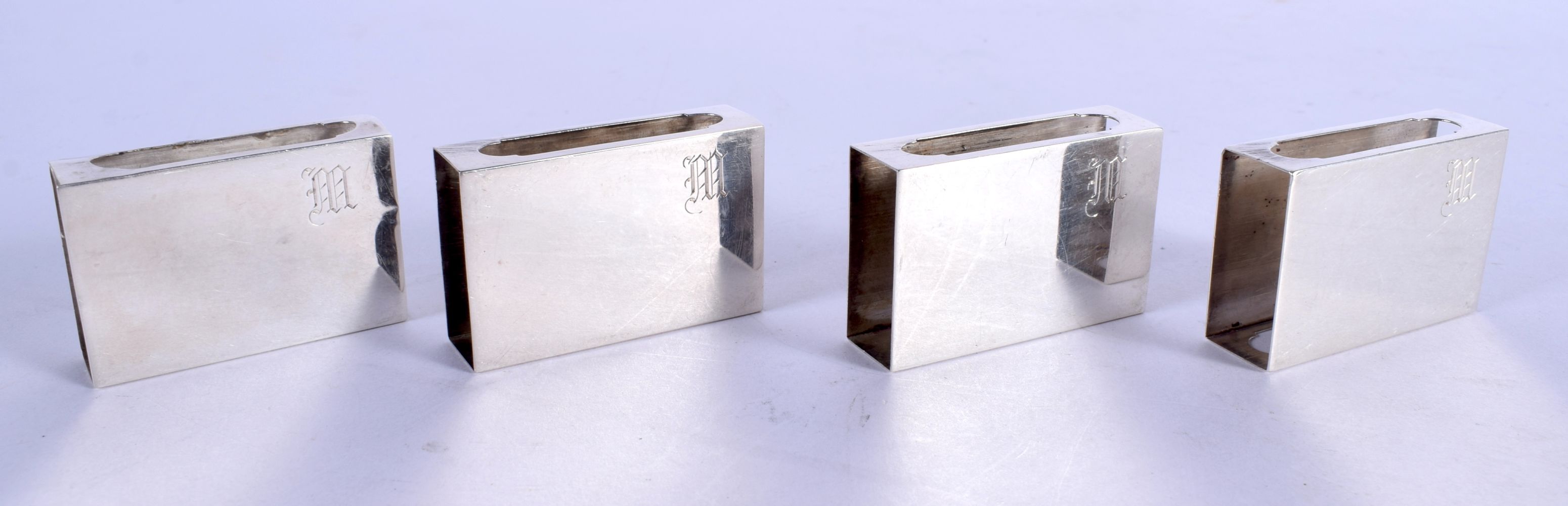 FOUR SILVER MATCHBOX HOLDERS. 42 grams. 4.5 cm x 3 cm. (4)