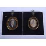 A PAIR OF EARLY 19TH CENTURY CARVED IVORY PORTRAIT MINIATURES. Image 7.5 cm x 5 cm.