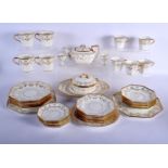 AN ANTIQUE WEDGWOOD PORCELAIN PART TEASET painted with gilt scrolls in the neo classical manner. (qt