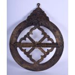 A LARGE MIDDLE EASTERN ISLAMIC BRONZE ASTROLABE with engraved kufic style inscription. 27 cm wide.