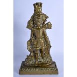 AN ANTIQUE BRONZE FIGURAL DOOR STOP modelled as a standing male. 26 cm x 12 cm.