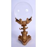 A 19TH CENTURY EUROPEAN BRONZE ACANTHUS CAPPED STAND supporting a crystal ball. 24 cm high.