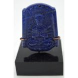 A carved Lapis Lazuli boulder depicting Durga on a stand 5 x 4cm. (2)