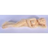 A CHINESE CARVED BONE MEDICINE DOLL 20th Century. 8 cm wide.