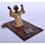 A LATE 19TH CENTURY AUSTRIAN COLD PAINTED BRONZE FIGURE OF AN ARABIC MALE modelled upon a carpet. 16