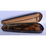 A CASED TWO PIECE BACK VIOLIN with bow. 58 cm long. (2)