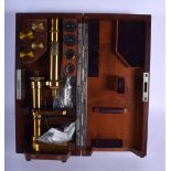 A BOXED ANTIQUE CARL ZEISS MICROSCOPE. Box 32 cm x 16 cm.
