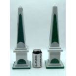 A pair of polished stone Obelisks with Malachite inserts.42cm.