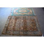 AN EARLY 20TH CENTURY MIDDLE EASTERN PERSIAN RUG together with a deco style rug. Largest 175 cm x 12