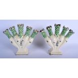 A RARE PAIR OF 18TH CENTURY CREAMWARE TULIP VASES painted with blue and green corn type flowers. 21