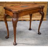 A RARE EARLY 19TH CENTURY ANGLO INDIAN COLONIAL CARD TABLE with folding top upon acanthus capped fin