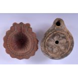 TWO SOUTHERN EUROPEAN POTTERY LAMPS possibly Roman. 8 cm x 6 cm. (2)