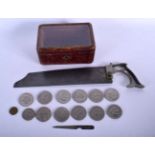 AN ANTIQUE MILITARY FIELD SAW together with a leather box of coins. (qty)