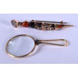A SCOTTISH GOLD AND AGATE DIRK DAGGER BROOCH and another. 5 grams. (2)