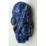 A carved Lapis Lazuli boulder 7 cm.