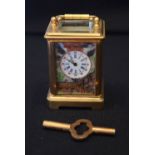 A CONTEMPORARY IMARI PORCELAIN INSET MINIATURE CARRIAGE CLOCK. 8 cm x 4 cm inc handle.