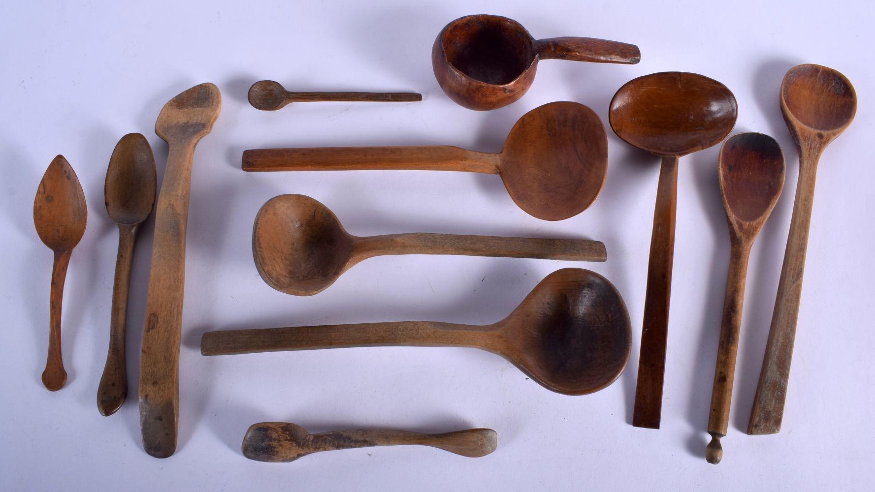 ASSORTED ANTIQUE TREEN SPOONS in various forms and sizes. Largest 16 cm long. (qty)