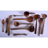 ASSORTED ANTIQUE TREEN SPOONS in various forms and sizes. Largest 16 cm long. (qty)