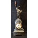 A VINTAGE AMERICAN SPELTER LIBERTY CLOCK. 36 cm high.