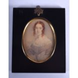 AN EARLY 19TH CENTURY PAINTED WATERCOLOUR SKETCH MINIATURE depicting a female wearing a blue & white