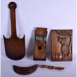 AN ANTIQUE TREEN CARVED WOOD THUMB PIANO together with other wood ware. (qty)