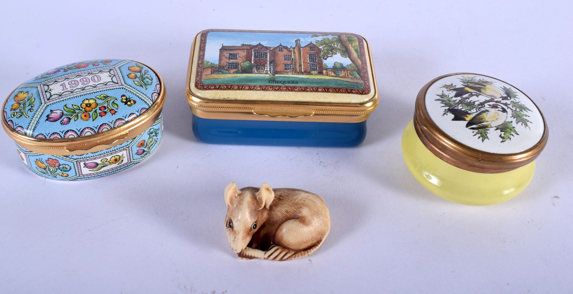 THREE HALCYON DAYS ENAMELLED BOXES together with a netsuke. (4)