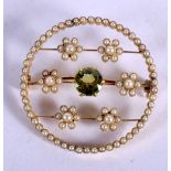 A FINE EDWARDIAN GOLD PEARL AND PERIDOT BROOCH. 9 grams. 3.5 cm diameter.