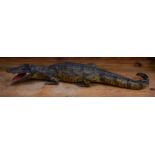 AN ANTIQUE TAXIDERMY ALLIGATOR. 82 cm long.