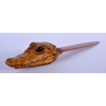 AN EARLY 20TH CENTURY EUROPEAN CROCODILE TAXIDERMY LETTER OPENER with plain shaft. 27 cm long.