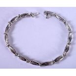 A WHITE METAL GEM SET BRACELET. 9 grams. 18 cm long.