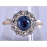 AN EDWARDIAN 18CT GOLD DIAMOND AND SAPPHIRE RING. 4 grams. P/Q.