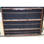 An antique wooden plate rack . 115 x 136cm .