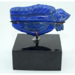 A carved Lapis Lazuli boulder on a stand 5 x 2.5cm.