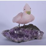 A 1930S CONTINENTAL CARVED QUARTZ AND AMETHYST DUCK. 14 cm x 11 cm.